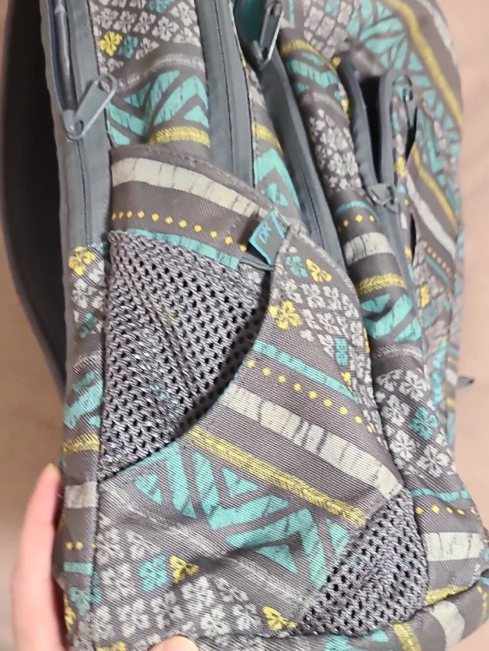 Gray Patterned Backpack with Aqua & Yellow Accents